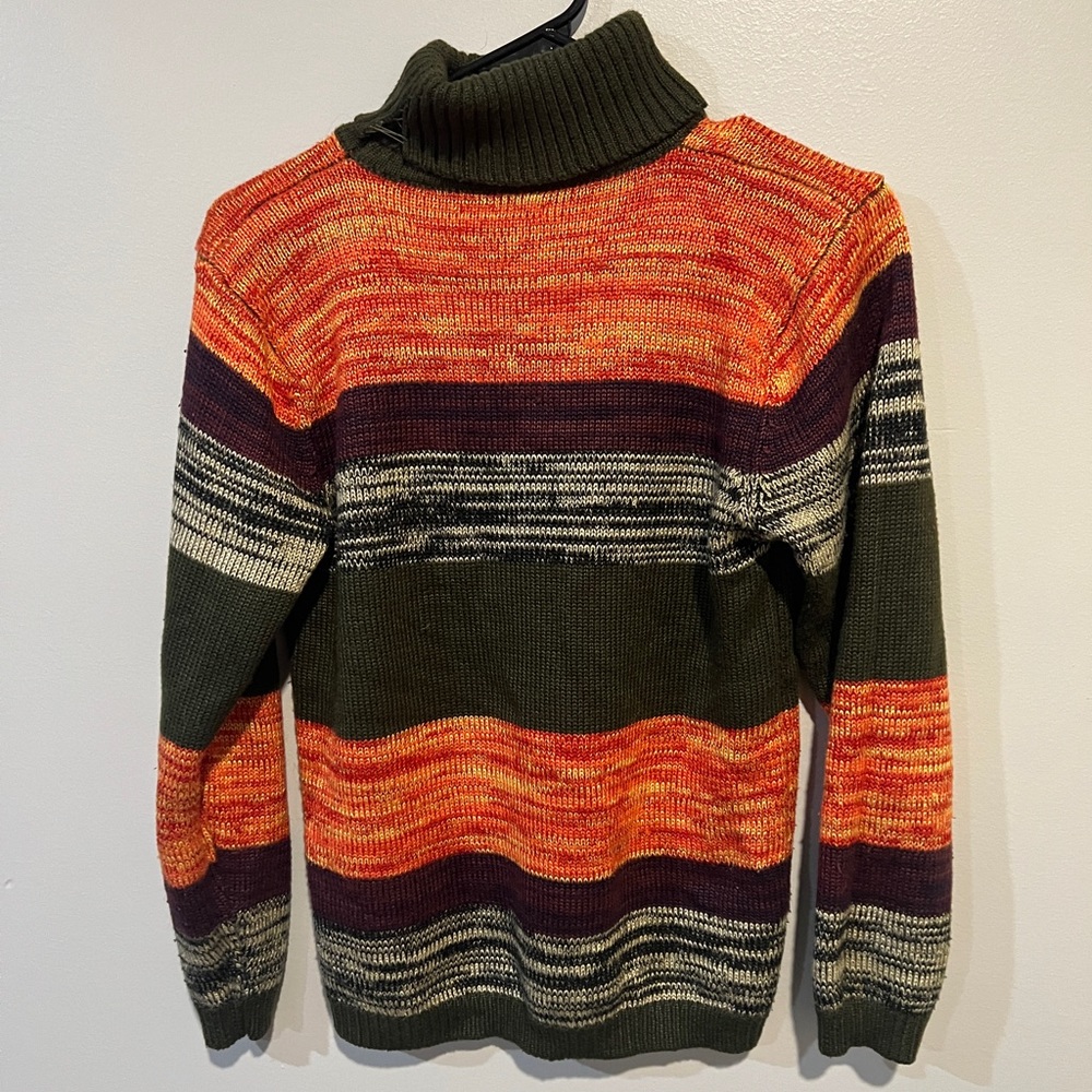 Blue Fox women’s sweater. Small tear in the neck, easily mendable.